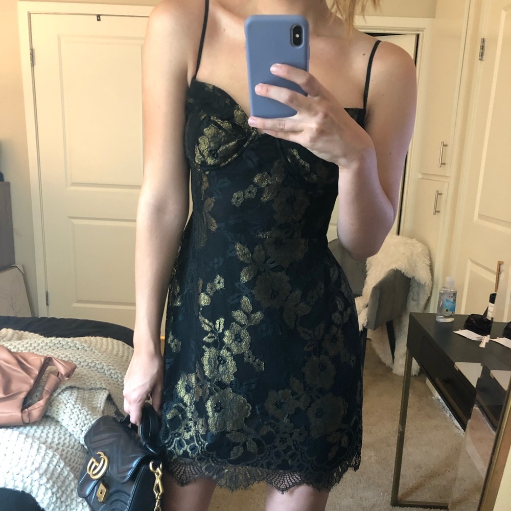 Black and gold lace dress